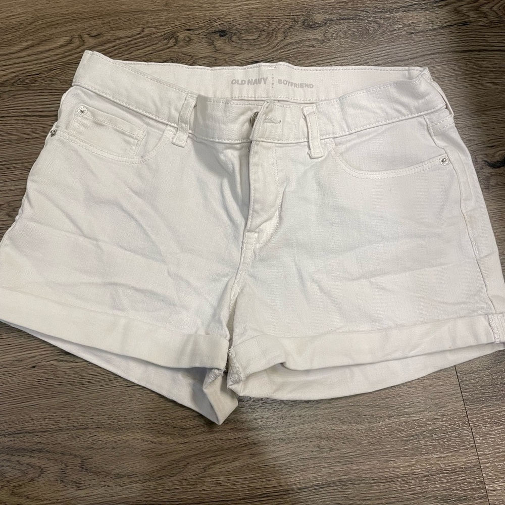 White denim mid-rise shorts.
